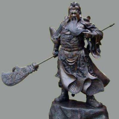 古銅關公像，右手持刀左手捻須站立的關于銅雕像