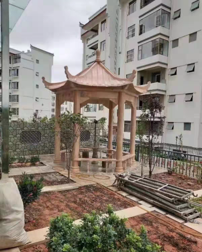 小區(qū)園林石涼亭，晚霞紅大理石石雕亭子
